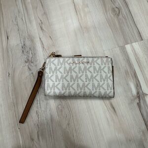 Michael Korrs wallet clutch